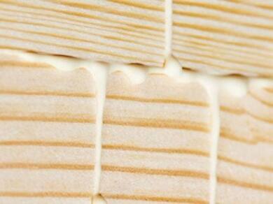 PVA adhesive applied between timber boards to create a strong bond for woodworking and joinery projects