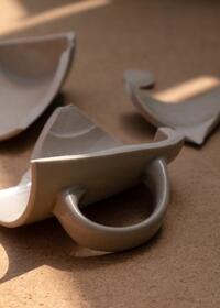 Damaged ceramic item awaiting repair with a strong bonding adhesive